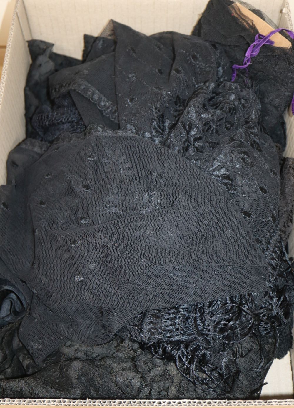 A fine 19th century black silk shawl, a net stole, various bobbin and machine trim